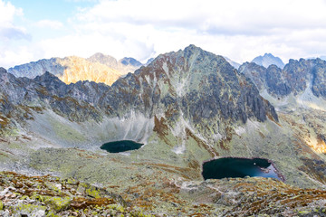 Hiking in High Tatras Mountains (Vysoke Tatry), Slovakia. Okruhle pleso lake (2105m) and Capie Pleso lake (2075m). Mount Strbsky Stit (2381m) on background. View from Furkotsky Stit mount (2403m)