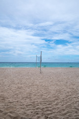 A volleyball net on a beach