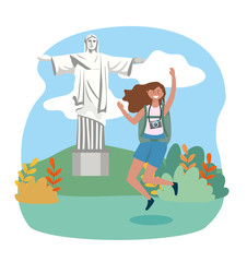 woman jumping with backpack and camera to christ redeemer destination