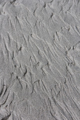 Sand with vertical water ridges