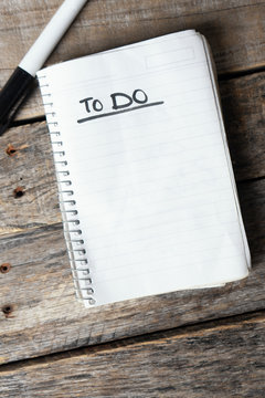 To do list blank  written with black marker on  notebook