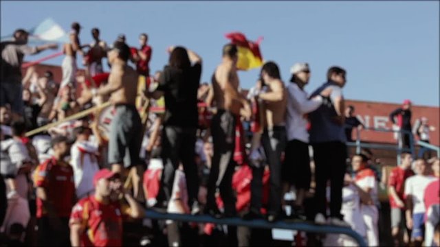Blurred Crowd Of People, Supporters And Fans.
