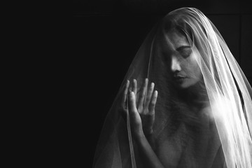 nude portrait of Asian model in dark tone