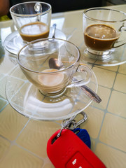 The delicious coffee left after drinking in the cups.