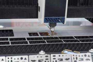 CNC Laser cut machine is working.