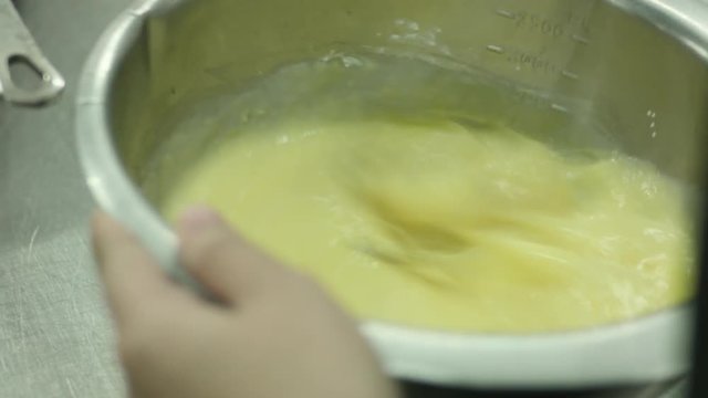 Whisking Eggs And Milk Together