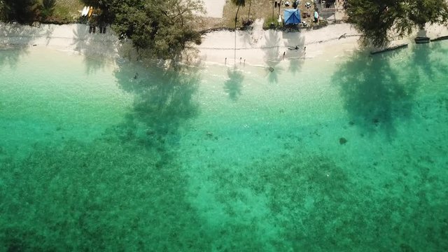 Drone view of beautiful beach. Aerial drone shot of turquoise sea water at the beach