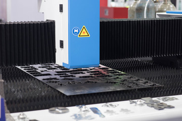 CNC Laser cut machine is working.