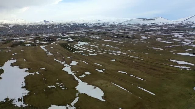 Sevan and Mountains of Armenia Lake Shot from Drone.