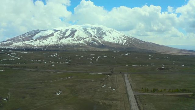 Sevan and Mountains of Armenia Lake Shot from Drone.