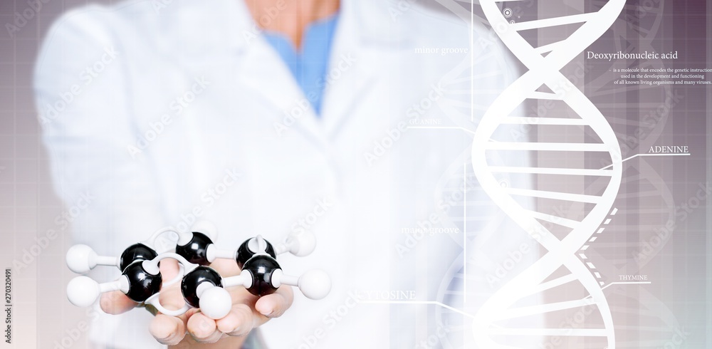 Wall mural close up of molecular structure model in hand on background