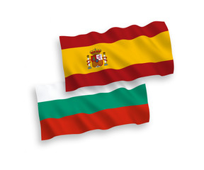 National vector fabric wave flags of Bulgaria and Spain isolated on white background. 1 to 2 proportion.