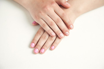 Hands with beautiful manicure in salon. Fashion