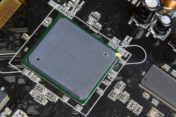 black computer video board with a processor, microcontroller, smd circuit