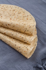 Lavash, tortilla, lavaş, flat and thin bread on table 