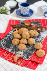 Homemade cookies on wooden table with small coffee cups, turkish coffee , gourmet cookies