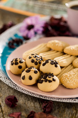 Homemade cookies on wooden table with small coffee cups, turkish coffee , gourmet cookies