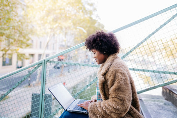 young woman with laptop