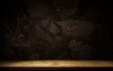 Old wooden table with brick background dark