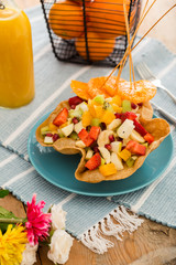 fruit salad in eatable tortilla bowl is a fun and colorful way to eat or diet