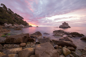 Fototapeta na wymiar The cala dels frales in lloret de mar at sunrise