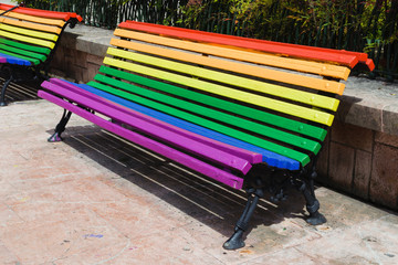 Pride day concept. Wood from a bench painted in rainbow colors