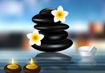 Spa concept zen stones and frangipani flowers