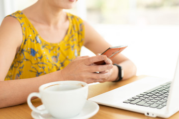 woman working and using cellphone