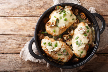 Lombardy Chicken breasts cooked with mushrooms, green onions, mozzarella cheese and parmesan...