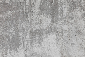 The texture of old concrete wall for background with a concrete splash on the wall 