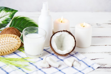 Relax and spa theme. Coconut, coconut oil, milk, candles, massage brush