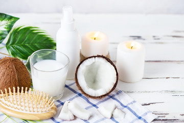 Relax and spa theme. Coconut, coconut oil, milk, candles, massage brush