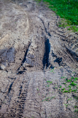 Dirty road in the countryside close up.