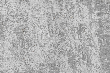 The texture of the old grey concrete wall with scratches, cracks, dust, crevices, roughness, stucco. Can be used as a poster or background for design