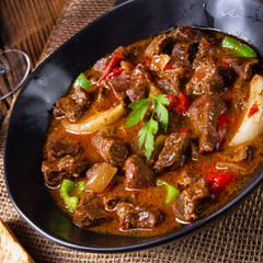 classic beef goulash with peppers and onions