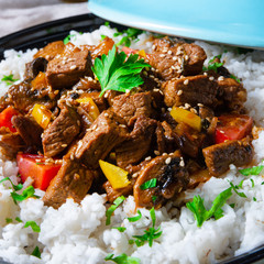 Tajin beef stew with rice paprika and sesame seeds