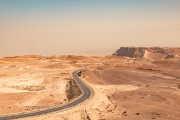 Road to Masada Castle through the desert