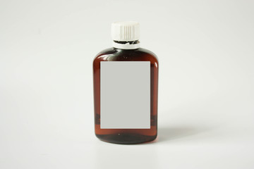 dark flat bottle on white with copyspace