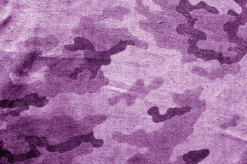 Dirty camouflage cloth in purple tone.