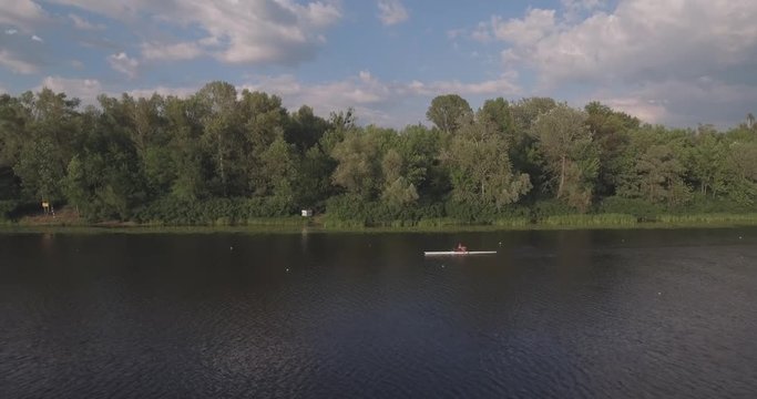 4K. Aerial view. Training of rowers on the river. Training rowers on the river. Sporting Rowing Team Training. Rowing teams compete with each other.
