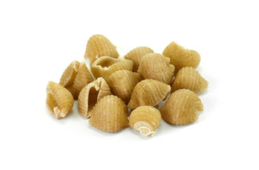 Wholemeal pasta on a white background 