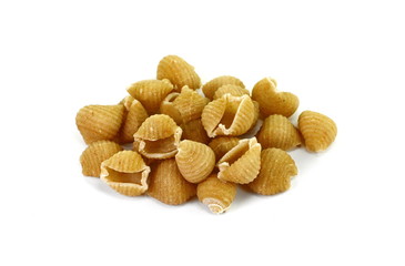 Wholemeal pasta on a white background 