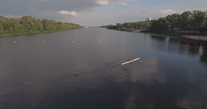 4K. Aerial view. Training of rowers on the river. Training rowers on the river. Sporting Rowing Team Training. Rowing teams compete with each other.