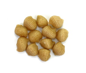 Wholemeal pasta on a white background 