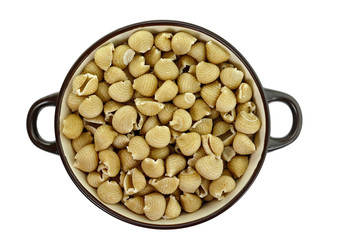 Wholemeal pasta on a white background 