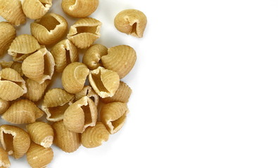 Wholemeal pasta on a white background 