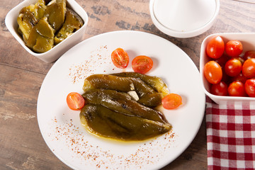 plate with green peppers marinated in olive oil