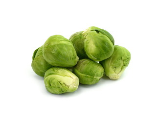 a pile of Brussels sprouts on a white background.