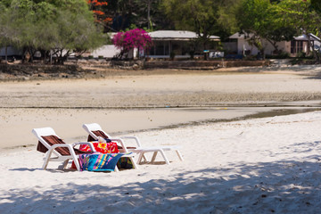 Sun bed on the beach  at Vongdeuan beach sunset in the Koh Samet island, Rayong, Thailand.