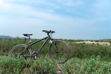 Fototapeta na wymiar Mountain bike parked on the mountain